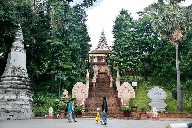 Classic Phnom Penh City Full Day Tour - Wat Phnom: climb for views, stay for the local practice