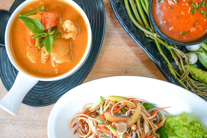 Discover the Tastes Temples and Tales of Authentic Cambodia - Day 2: Russian Market, Tuol Sleng S21, and a Tonlé-based happy hour cruise