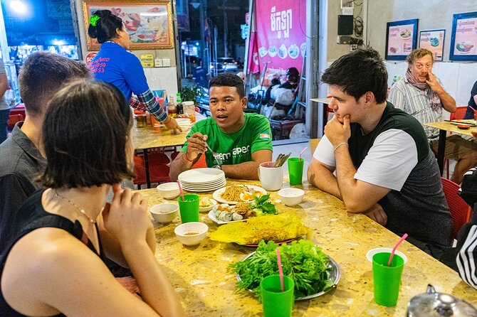 Phnom Penh Evening Food Tour - Inclusive 5 stops local Tastings - Stop 1: the riverfront first bite and Phnom Penh’s night air