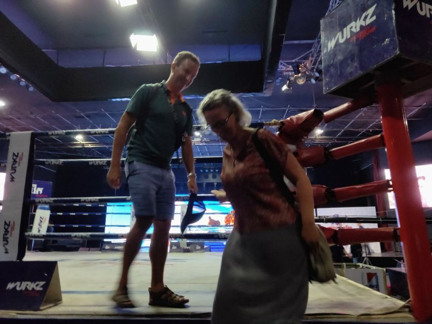 Phnom Penh:Kun Khmer Kickboxing Match at National TV Stadium - Getting in the ring after the fights: the fun part that lands