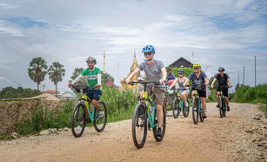 Phnom Penh: Silk Islands Half-Day Bike Tour - Riding the Mekong Trail: Dirt Roads, Views, and Ferry Breaks
