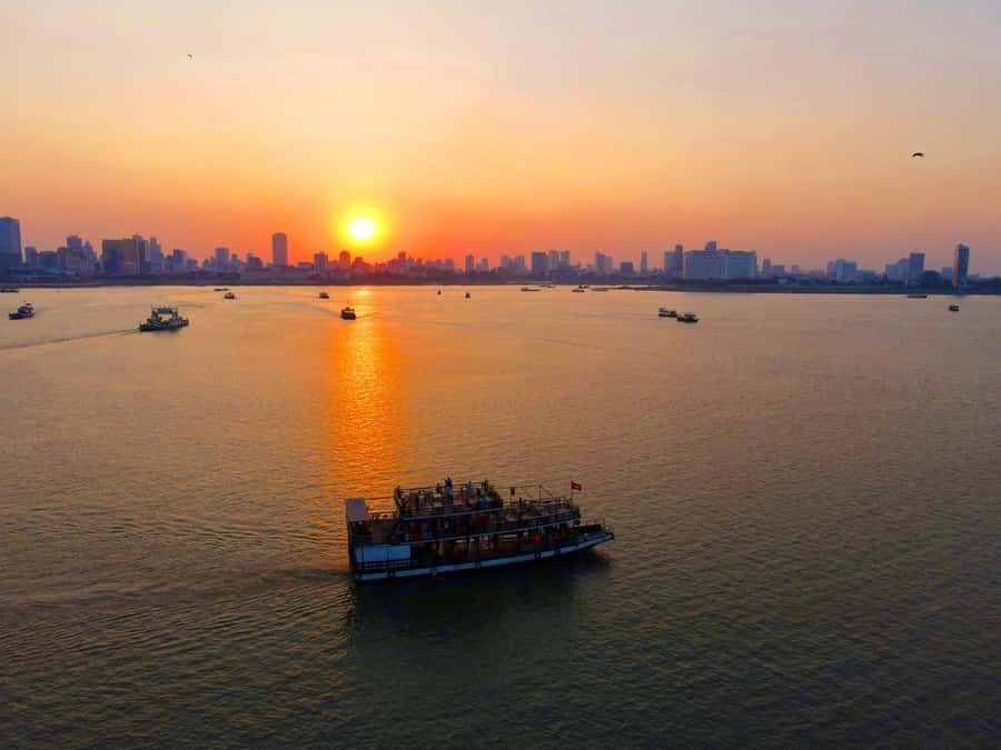 Phnom Penh: Sunset Cruise with Unlimited Beer &Fruit platter - Unlimited Beer, Soft Drinks, and Fresh Fruit: What’s Included and What Costs Extra
