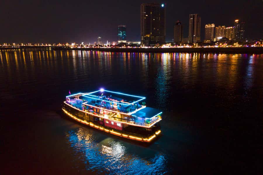 Phnom Penh: Sunset Dinner Cruise with English Speaking Guide - The 5pm start: pickup, boarding, and finding your boat