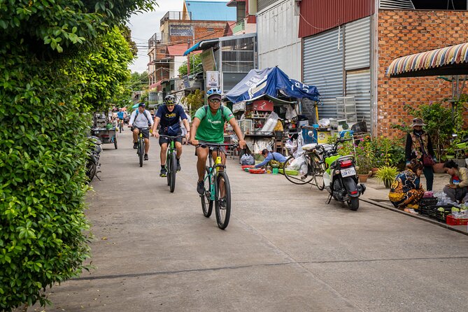 Phnom Penh to Silk Island Sunset Bike Tour/ E-Bike or Tuk Tuk - Sunset by the riverside: the payoff, plus a cold drink