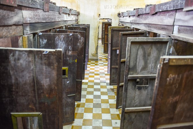 Remnants of a Khmer Rouge Era - Cheung Ek Killing Fields: mass graves and the stupa